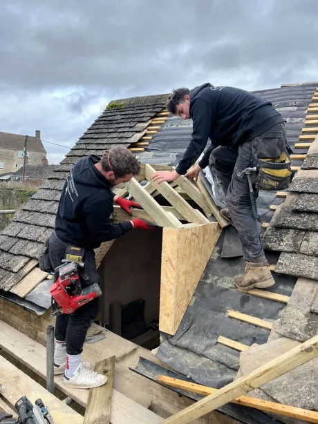 Replacement dormers finished in lead, with new rafters under them and an internal door moved.