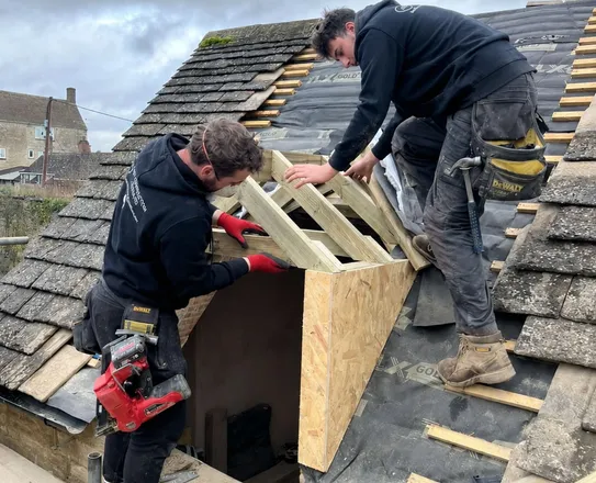 Replacement dormers finished in lead, with new rafters under them and an internal door moved.